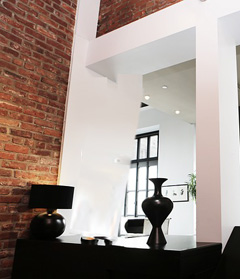 Indoor brick walls can be problematic for hanging art