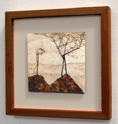A float-mounted artwork in a thin frame