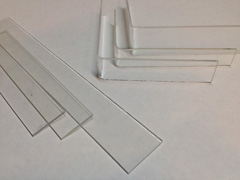 The strips in the foreground were bent to become the protective plastic corners behind