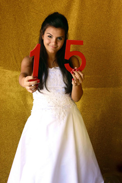 Formal teenage birthday photo with numbers 15
