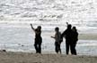 A Family At White Rock Seashore, Canada Stock Photos